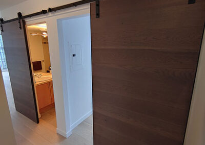 newly installed barn doors on bathroom